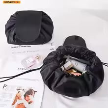 Lazy drawstring makeup bag open flat with makeup inside